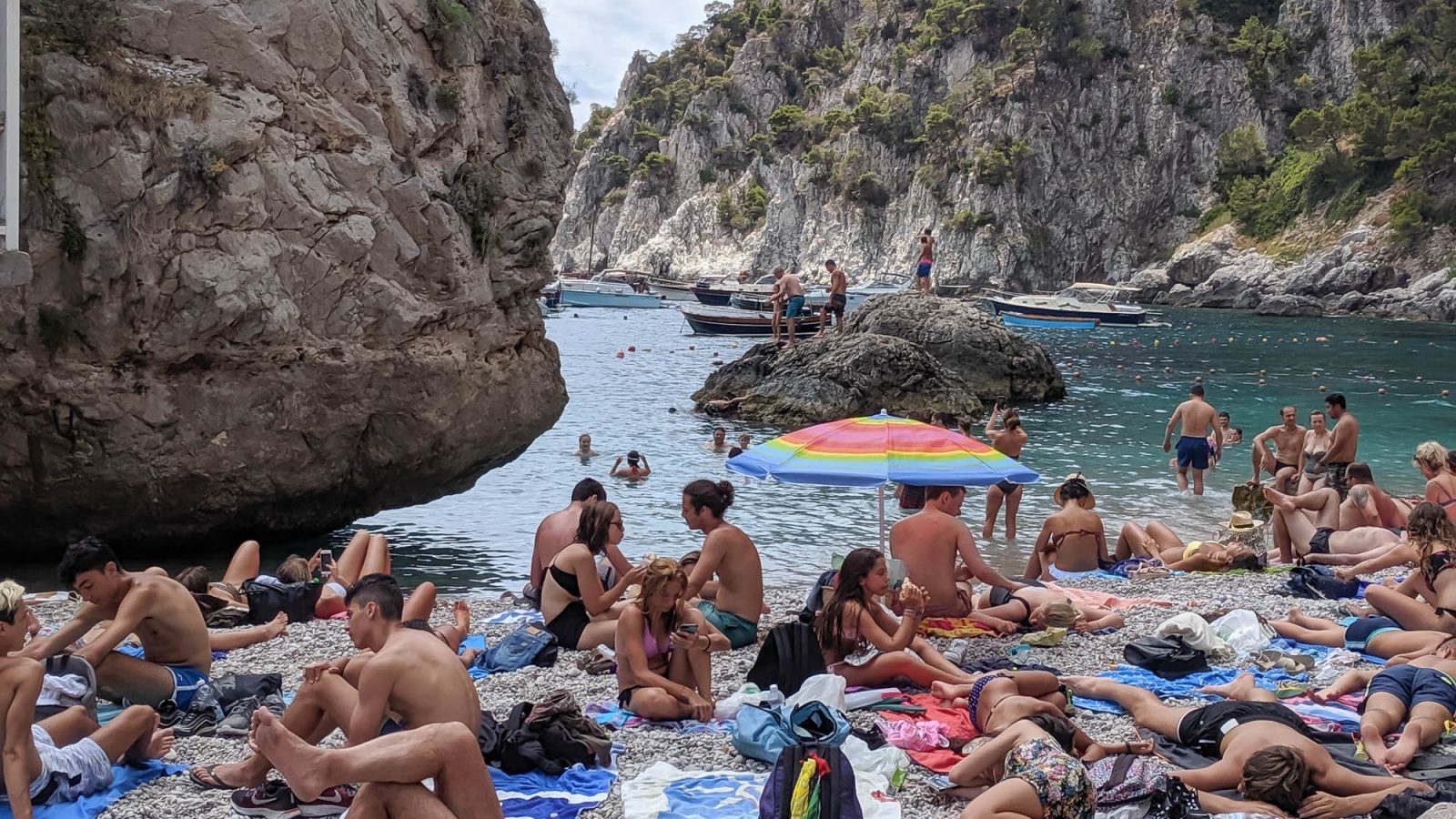 tiny beach packed with people
