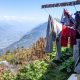 clothes hanging on a clothesline above a big mountain valley