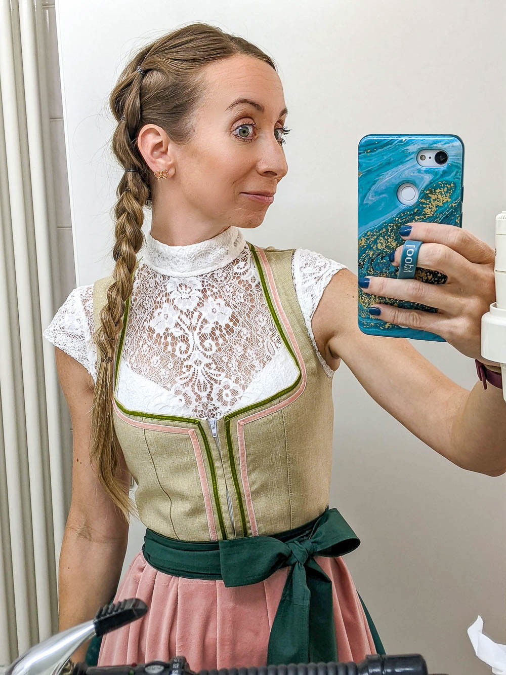 me in a tan dirndl and lace blouse taking a mirror selfie