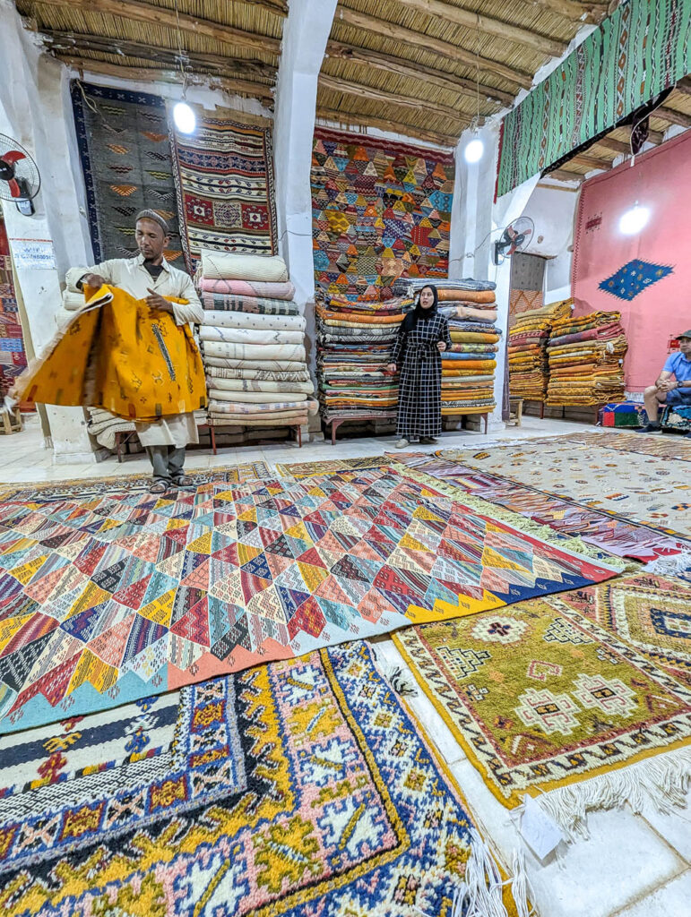 room filled with brightly colored carpets